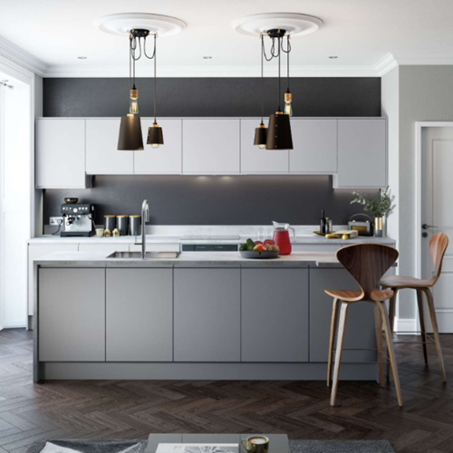 Sleek fitted kitchen in Dublin with gray cabinets and stylish lighting.