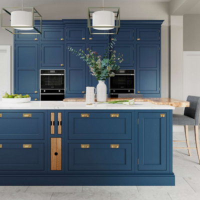 Elegant bespoke kitchen in Dublin with blue cabinetry and gold hardware.